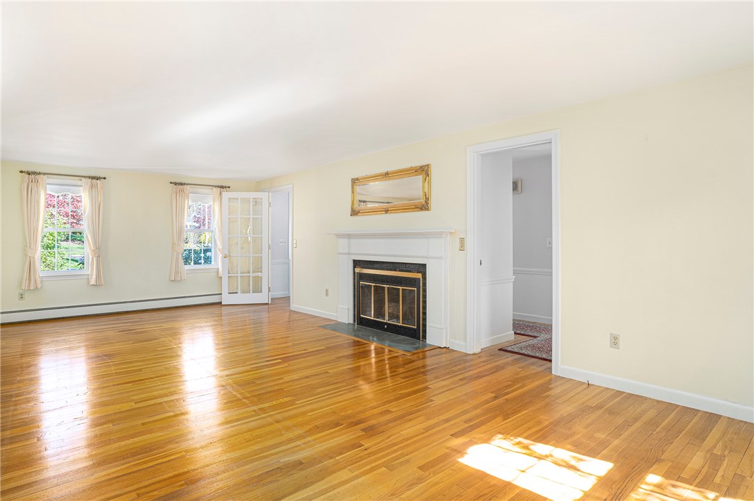 5 Great Road East Greenwich, RI 02818 - Photo 20 of 41 Living room with fireplace
