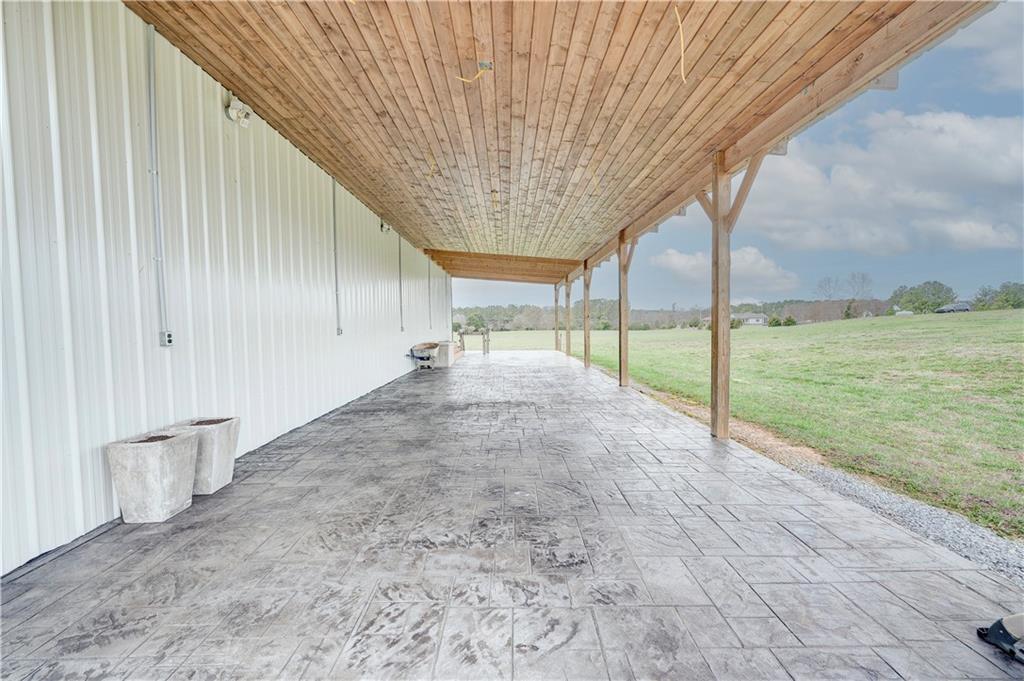 2453 Boone Ford Road Southeast Calhoun, GA 30701 - Photo 115 of 135 a view of an empty room with floor to ceiling windows