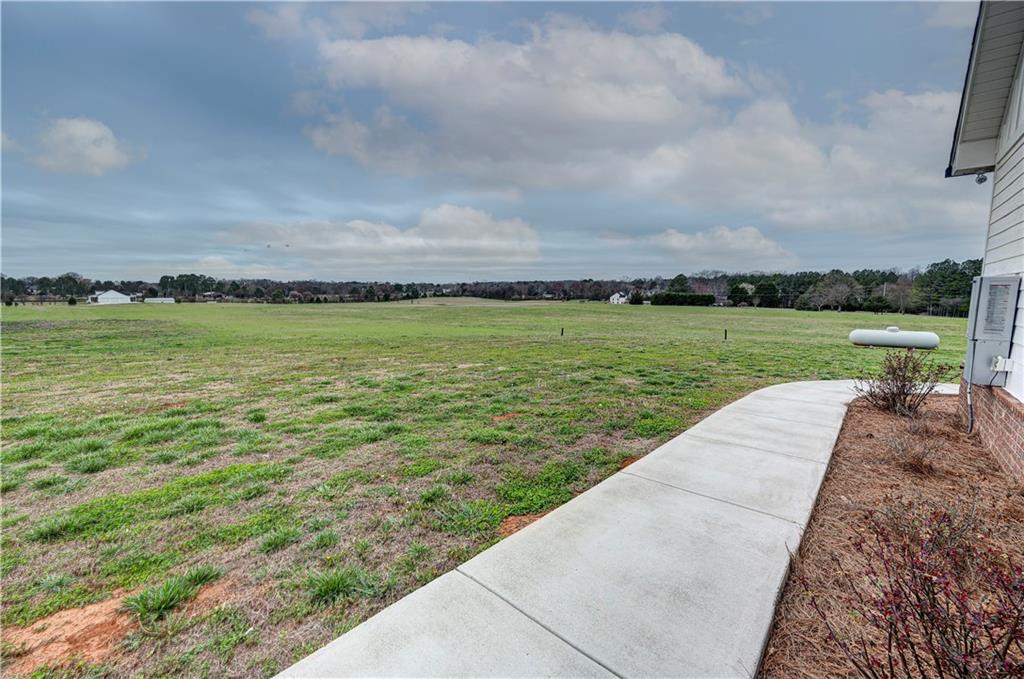 2453 Boone Ford Road Southeast Calhoun, GA 30701 - Photo 125 of 135 a view of a lake with a big yard