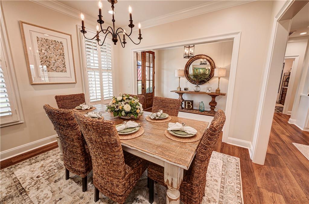 2453 Boone Ford Road Southeast Calhoun, GA 30701 - Photo 14 of 135 a view of a dining room with furniture window and wooden floor