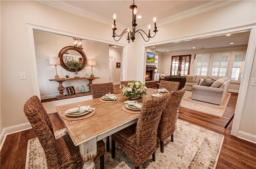 2453 Boone Ford Road Southeast Calhoun, GA 30701 - Photo 15 of 135 a view of a dining room with furniture wooden floor and chandelier