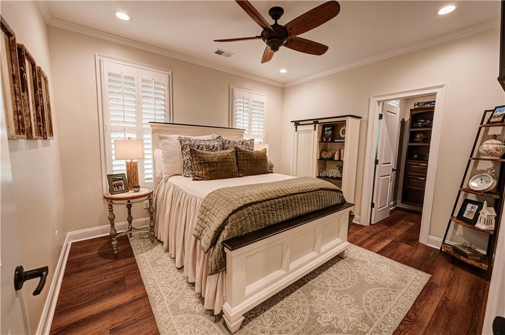 2453 Boone Ford Road Southeast Calhoun, GA 30701 - Photo 19 of 135 a bedroom with a bed and a flat screen tv