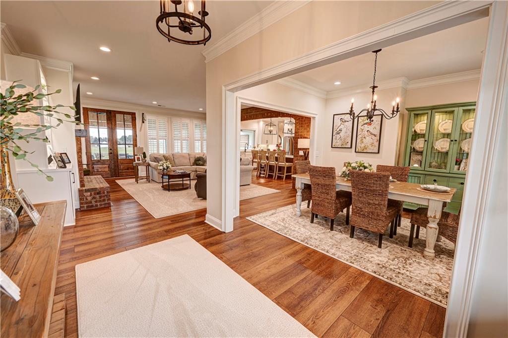 2453 Boone Ford Road Southeast Calhoun, GA 30701 - Photo 4 of 135 a view of a dining room with furniture window and wooden floor
