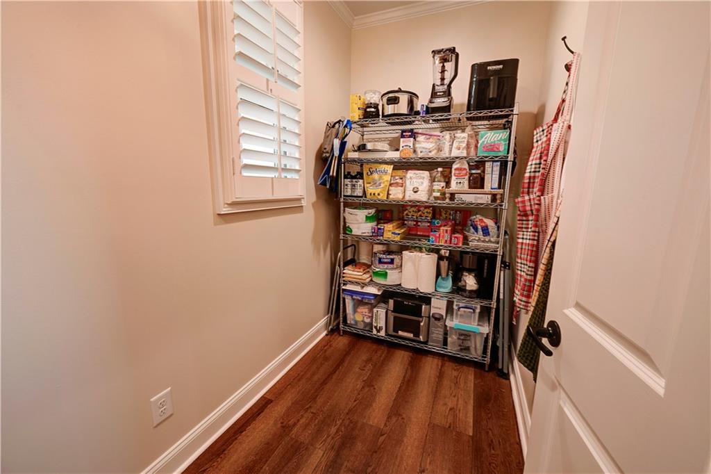 2453 Boone Ford Road Southeast Calhoun, GA 30701 - Photo 49 of 135 a view of a hallway with wooden floor and a window