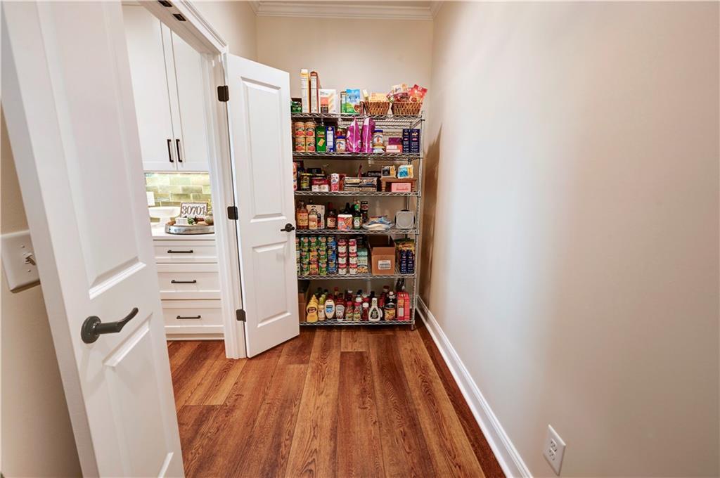 2453 Boone Ford Road Southeast Calhoun, GA 30701 - Photo 50 of 135 a view of walk in closet with clothes and shoes