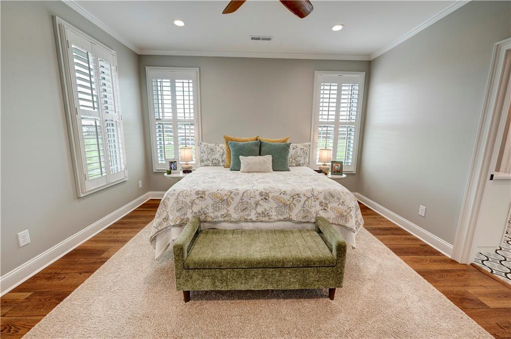 2453 Boone Ford Road Southeast Calhoun, GA 30701 - Photo 58 of 135 a bed sitting in a spacious bedroom next to a window