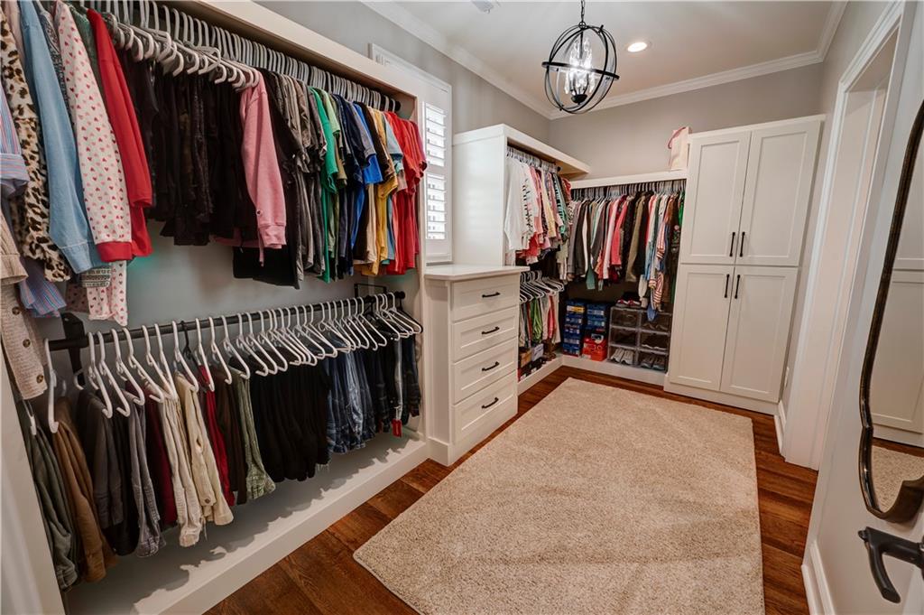 2453 Boone Ford Road Southeast Calhoun, GA 30701 - Photo 73 of 135 a view of walk in closet with clothes