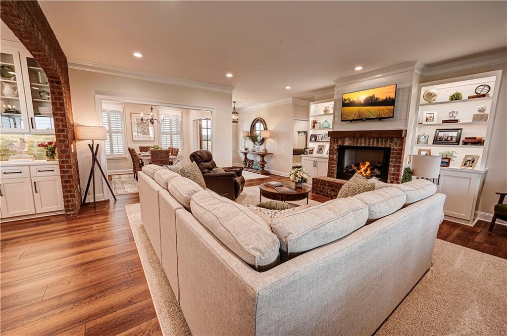 2453 Boone Ford Road Southeast Calhoun, GA 30701 - Photo 10 of 135 a living room with furniture fireplace and flat screen tv