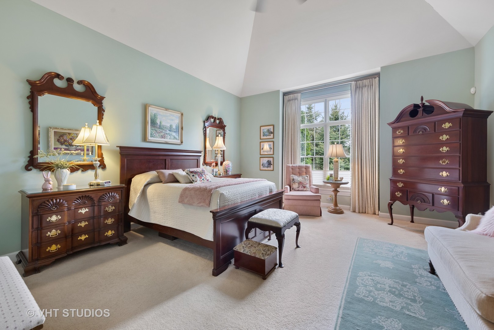 1001 Stacia Lane Lemont, IL 60439 - Photo 16 of 36 a spacious bedroom with a bed a couch and dresser