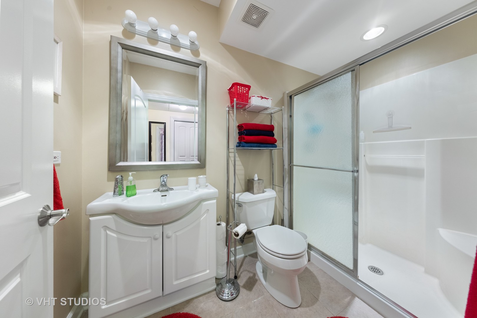 1001 Stacia Lane Lemont, IL 60439 - Photo 25 of 36 a bathroom with a toilet sink and mirror