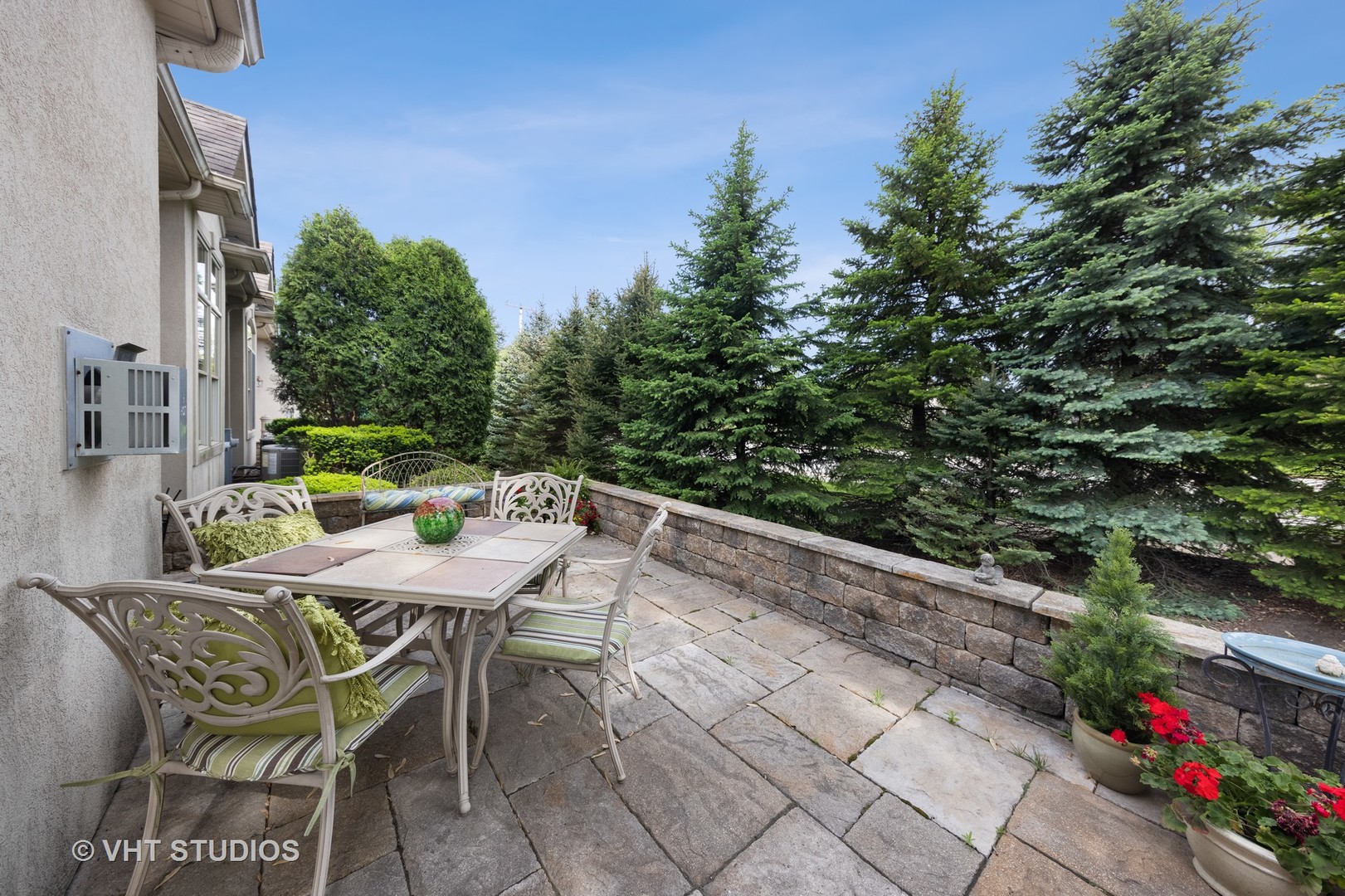 1001 Stacia Lane Lemont, IL 60439 - Photo 31 of 36 a patio with table and chairs and potted plants
