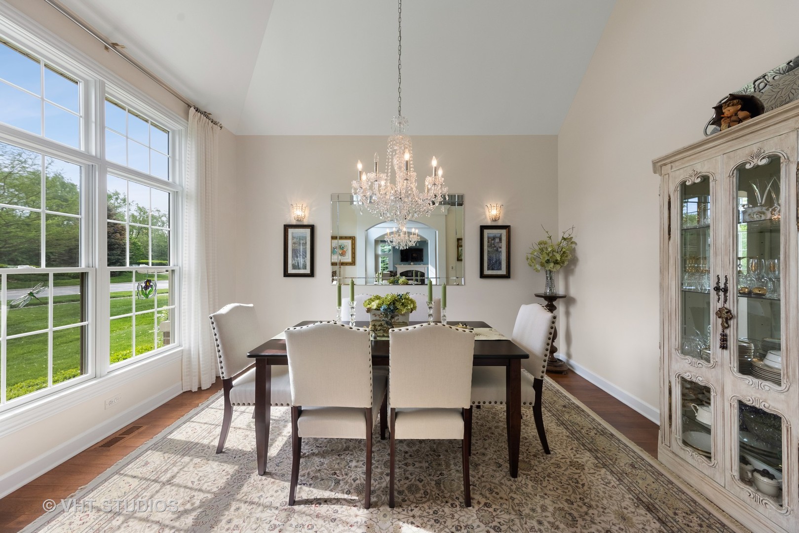 1001 Stacia Lane Lemont, IL 60439 - Photo 6 of 36 a view of a dining room with furniture a chandelier and wooden floor