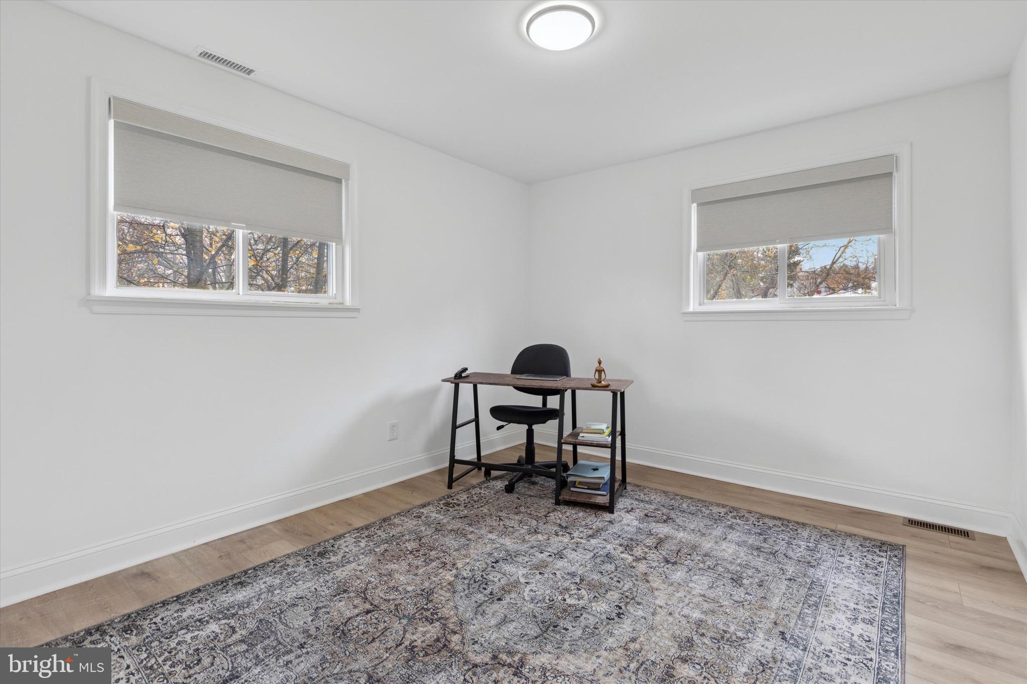 3023 Eisenhower Road Norristown, PA 19403 - Photo 12 of 22 a workspace with furniture and a window