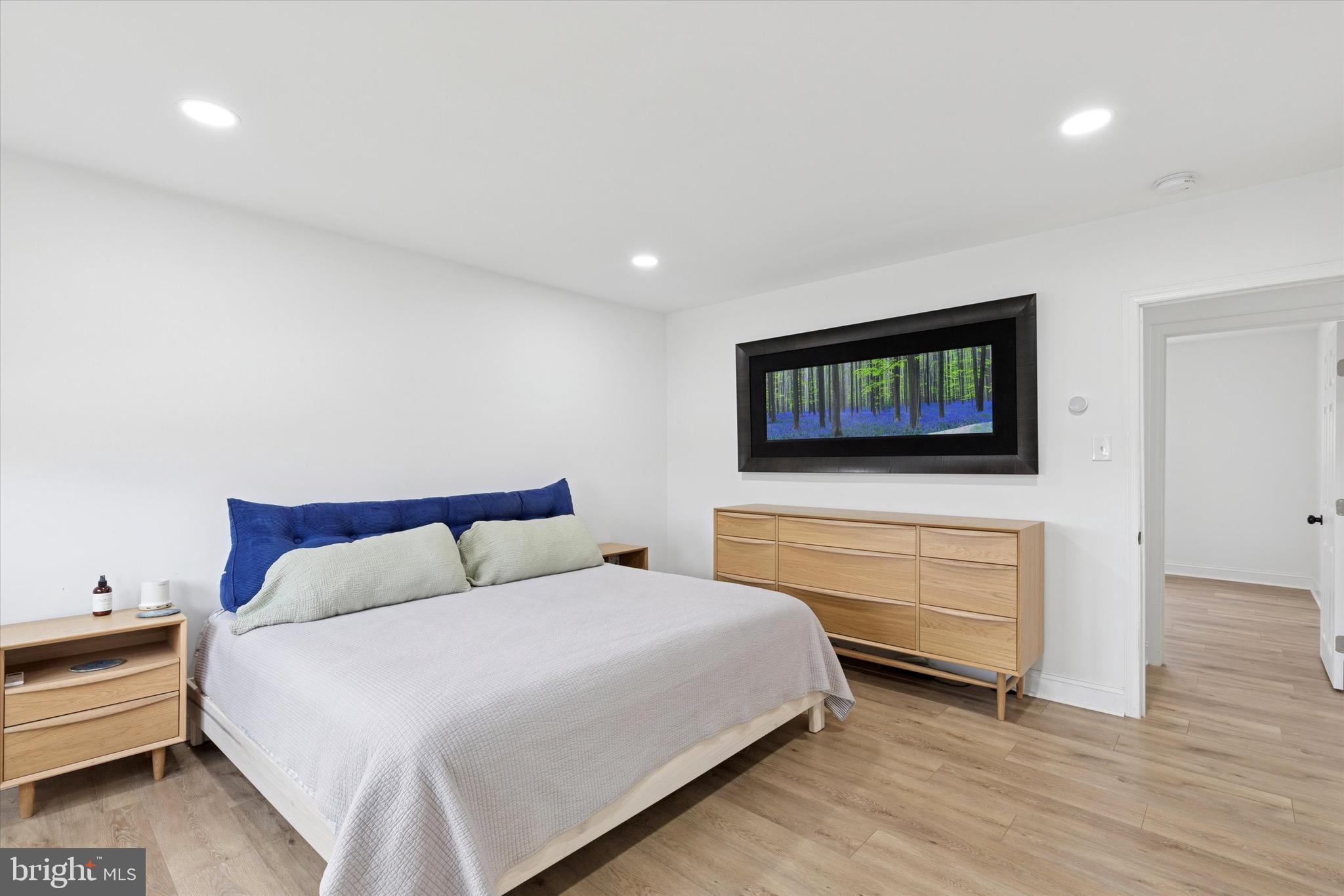 3023 Eisenhower Road Norristown, PA 19403 - Photo 14 of 22 a bedroom with a bed and a flat screen tv
