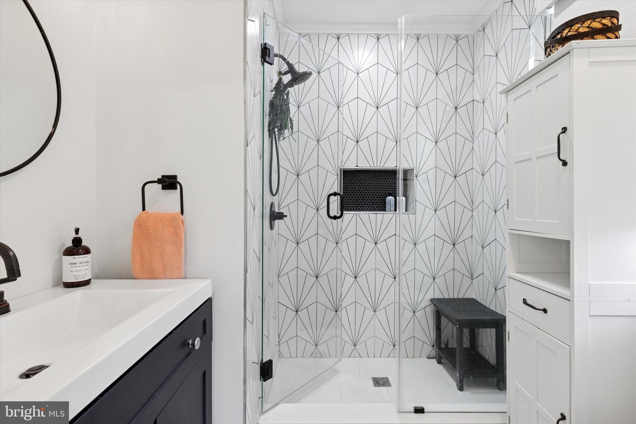 3023 Eisenhower Road Norristown, PA 19403 - Photo 16 of 22 a bathroom with a sink toilet and shower