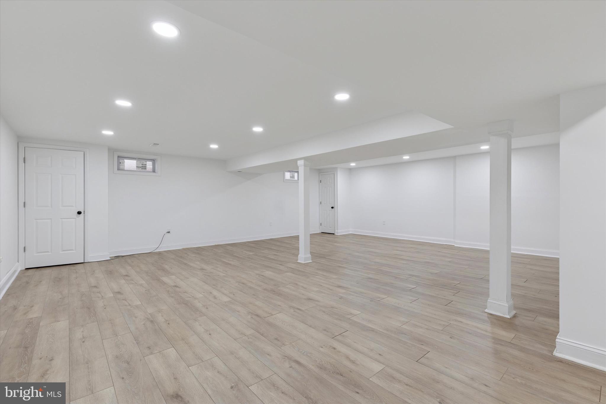 3023 Eisenhower Road Norristown, PA 19403 - Photo 18 of 22 a view of an empty room with wooden floor