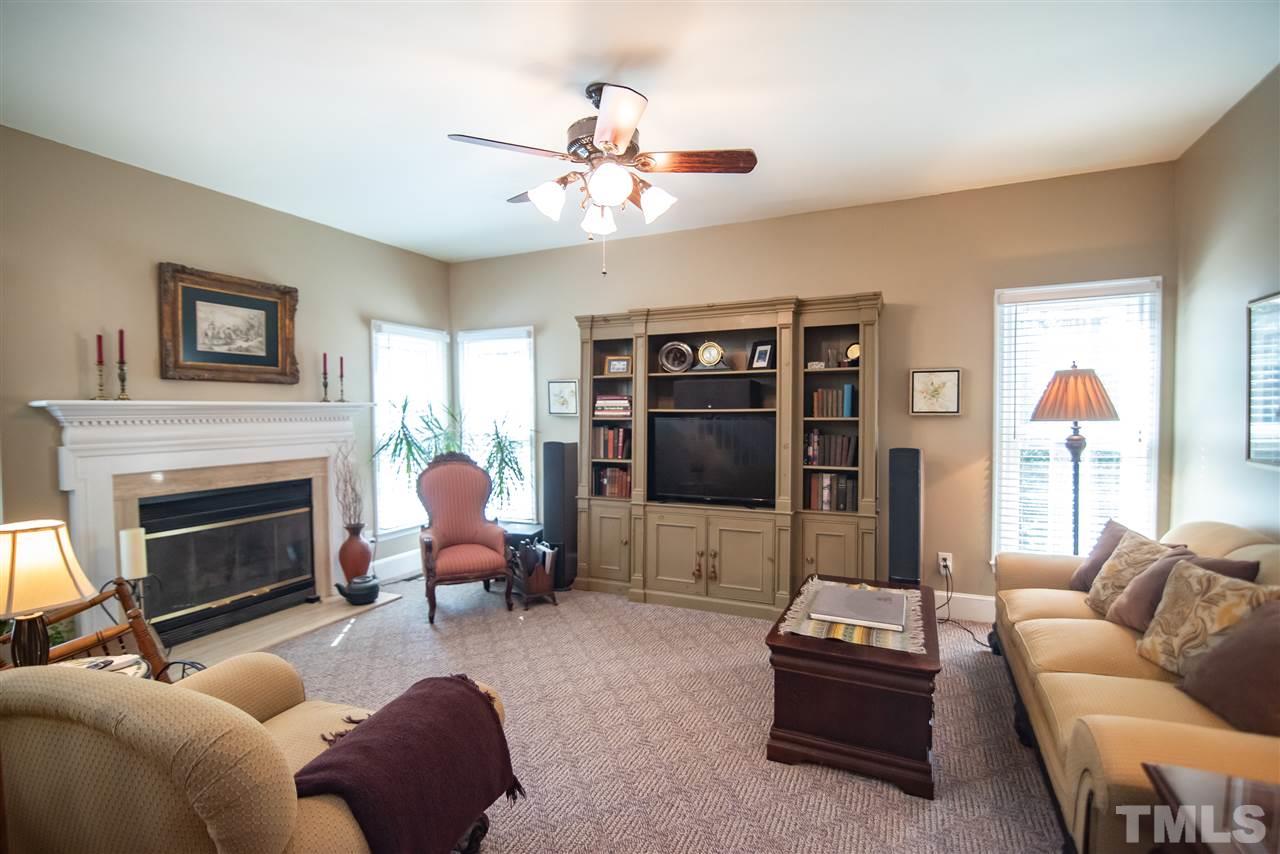 9716 Talman Court Raleigh, NC 27615 - Photo 11 of 30 Sunlight shines through the double pane windows.