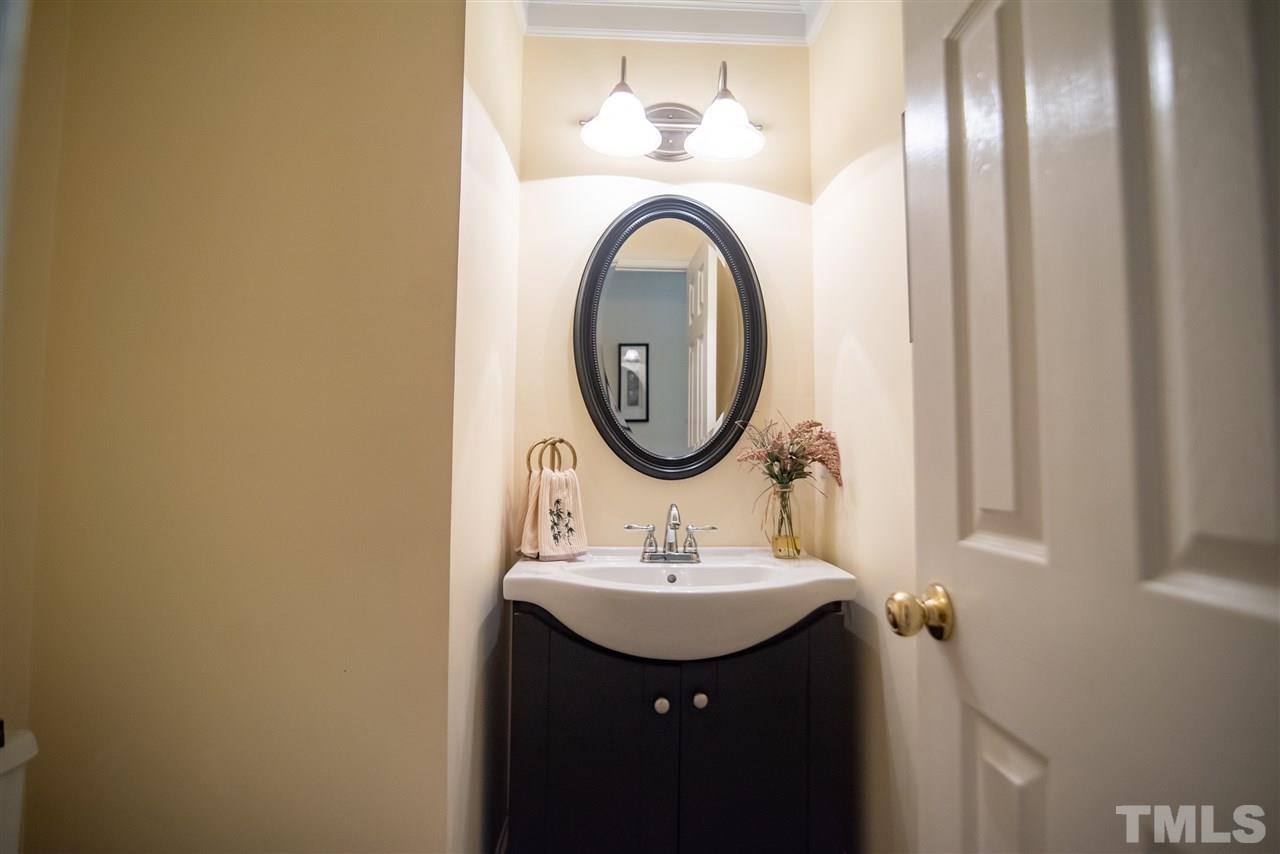 9716 Talman Court Raleigh, NC 27615 - Photo 18 of 30 Conveniently located hall bath.