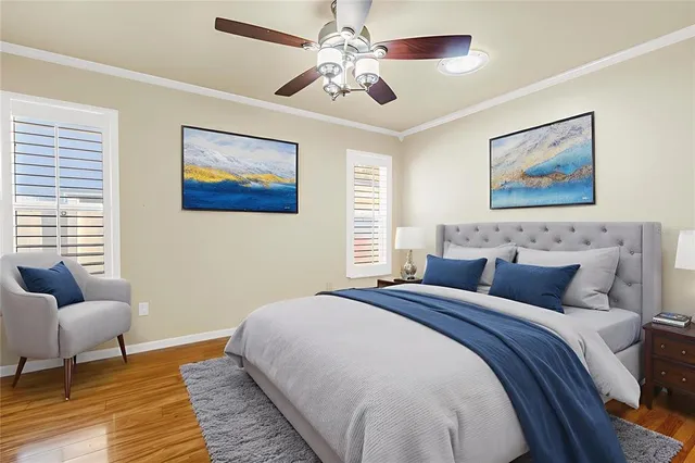 a bedroom with a bed and a couch