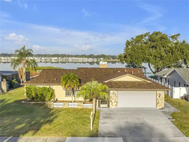 a view of a terrace with a lake view
