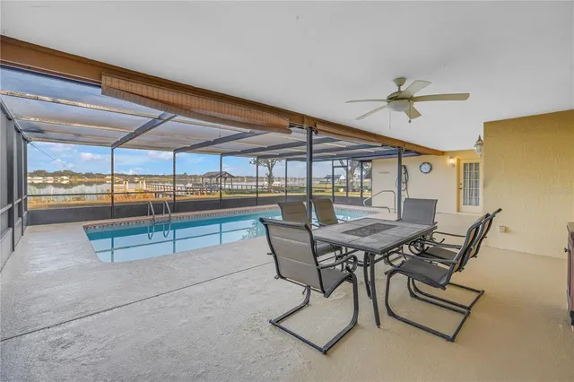 a view of a dining room with furniture and a table