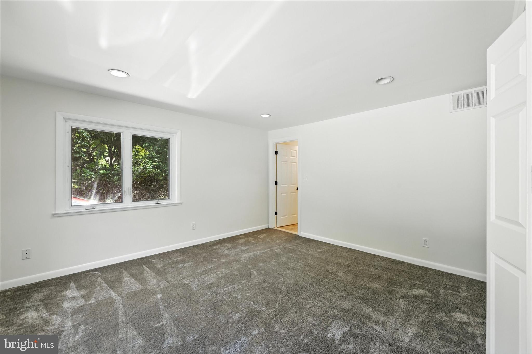 12325 Falls Road Cockeysville, MD 21030 - Photo 21 of 40 a view of an empty room with a window