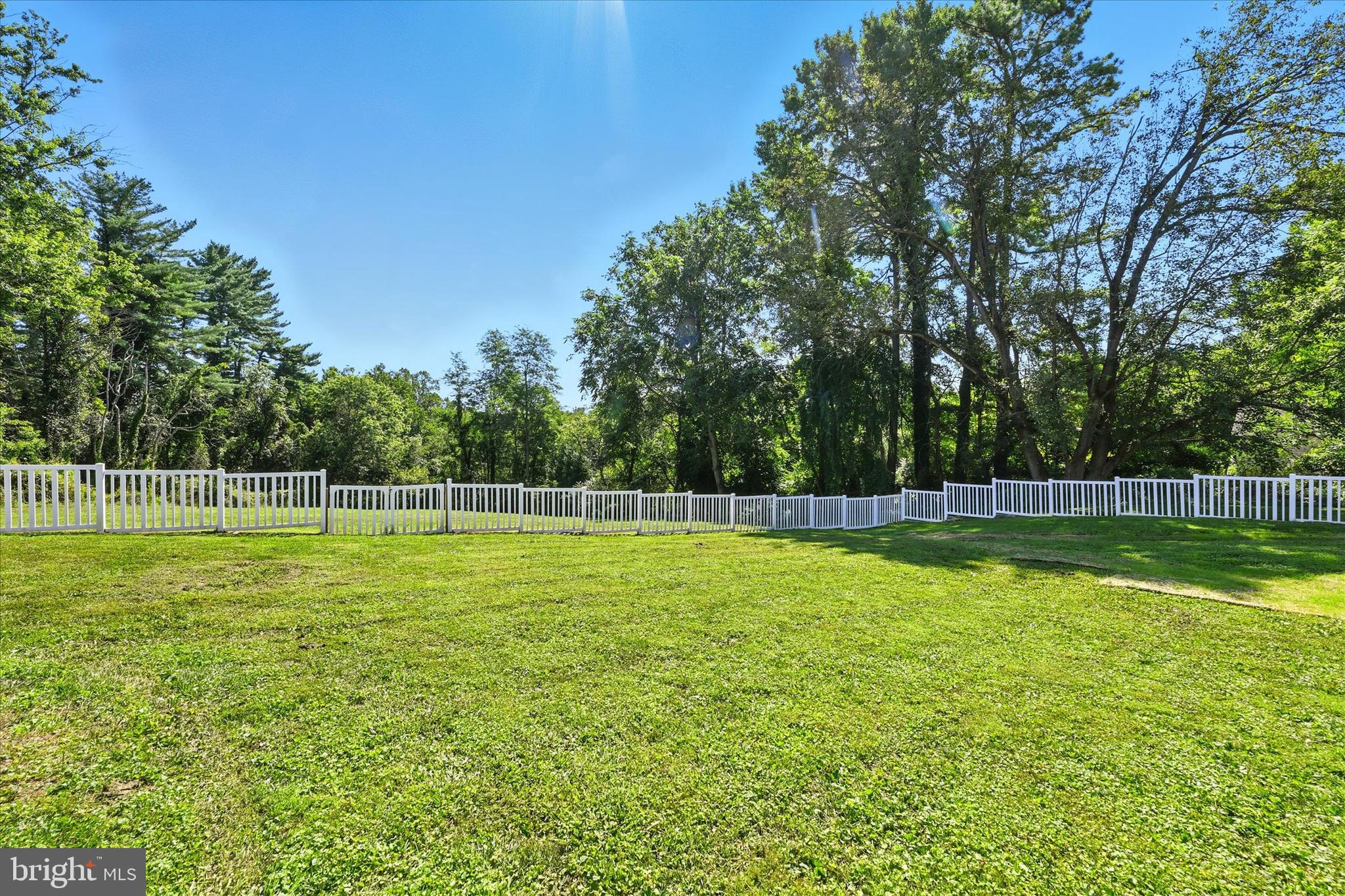 12325 Falls Road Cockeysville, MD 21030 - Photo 38 of 40 a view of a swimming pool with a yard