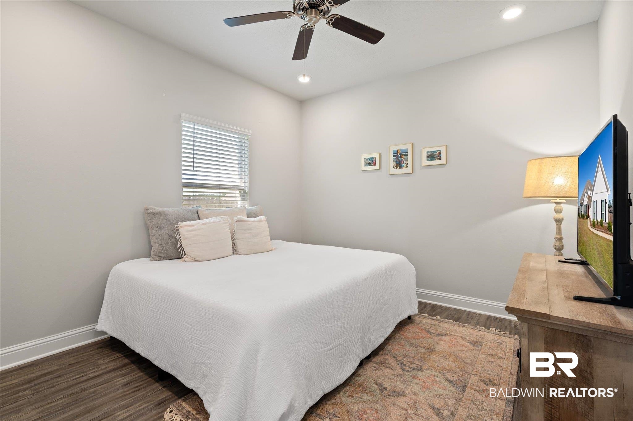 12899 Sanderling Loop Daphne, AL 36527 - Photo 17 of 28 Bedroom featuring dark hardwood / wood-style flooring and ceiling fan