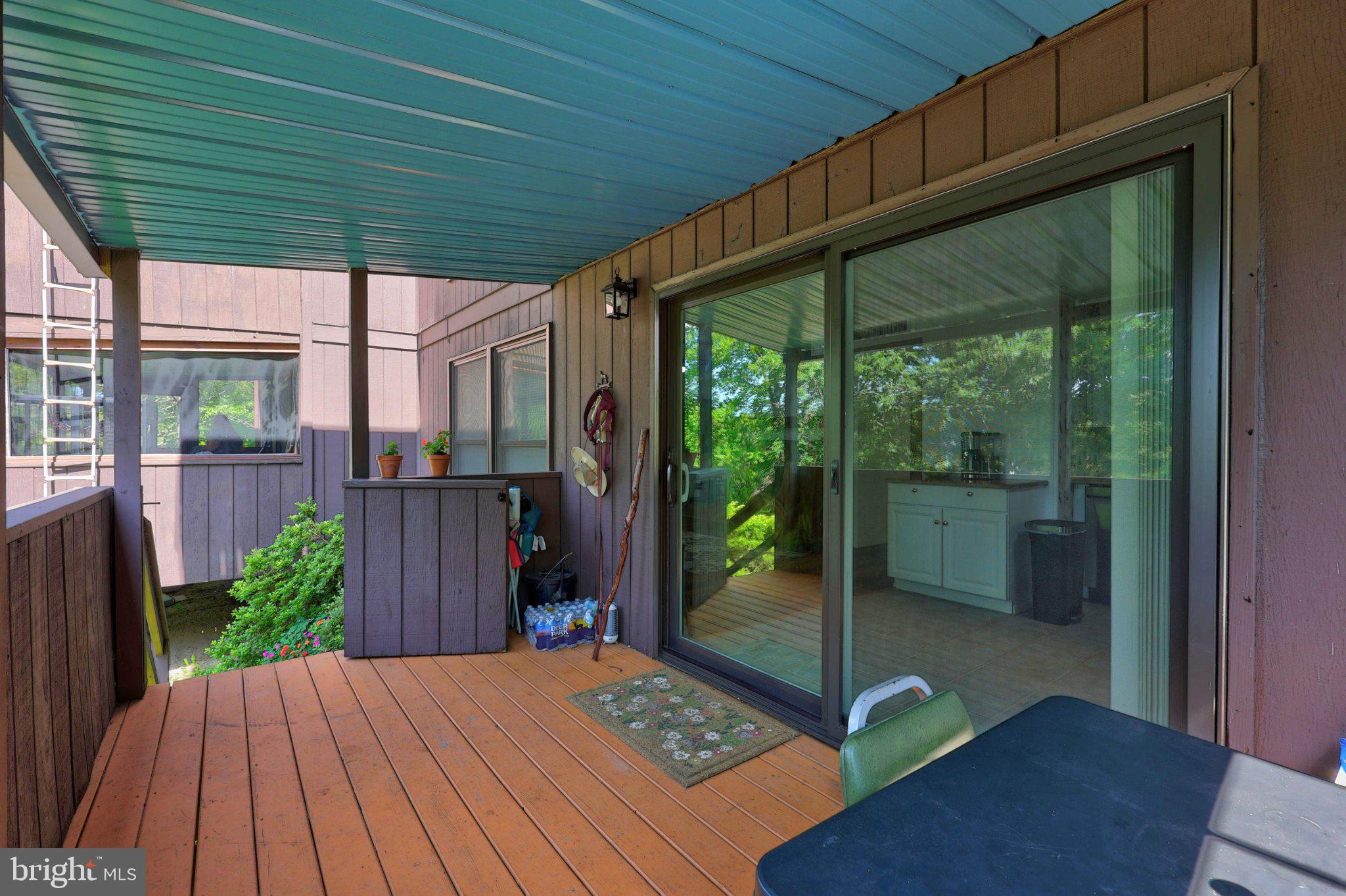 274 The Hill Road, Unit 13A Basye, VA 22810 - Photo 11 of 12 Serene outdoor retreat with lush views.