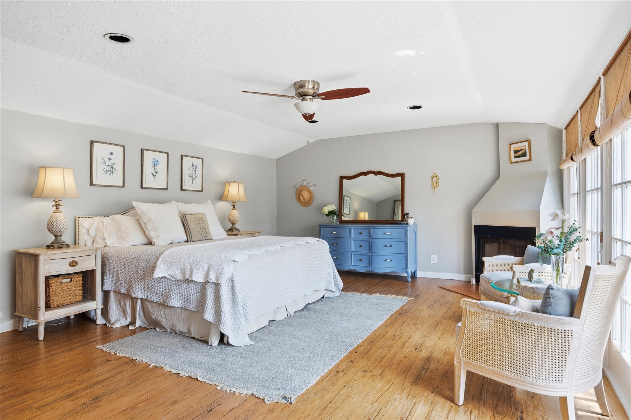 1507 Wethersfield Road Austin, TX 78703 - Photo 20 of 40 a bedroom with a large bed a mirror and a table