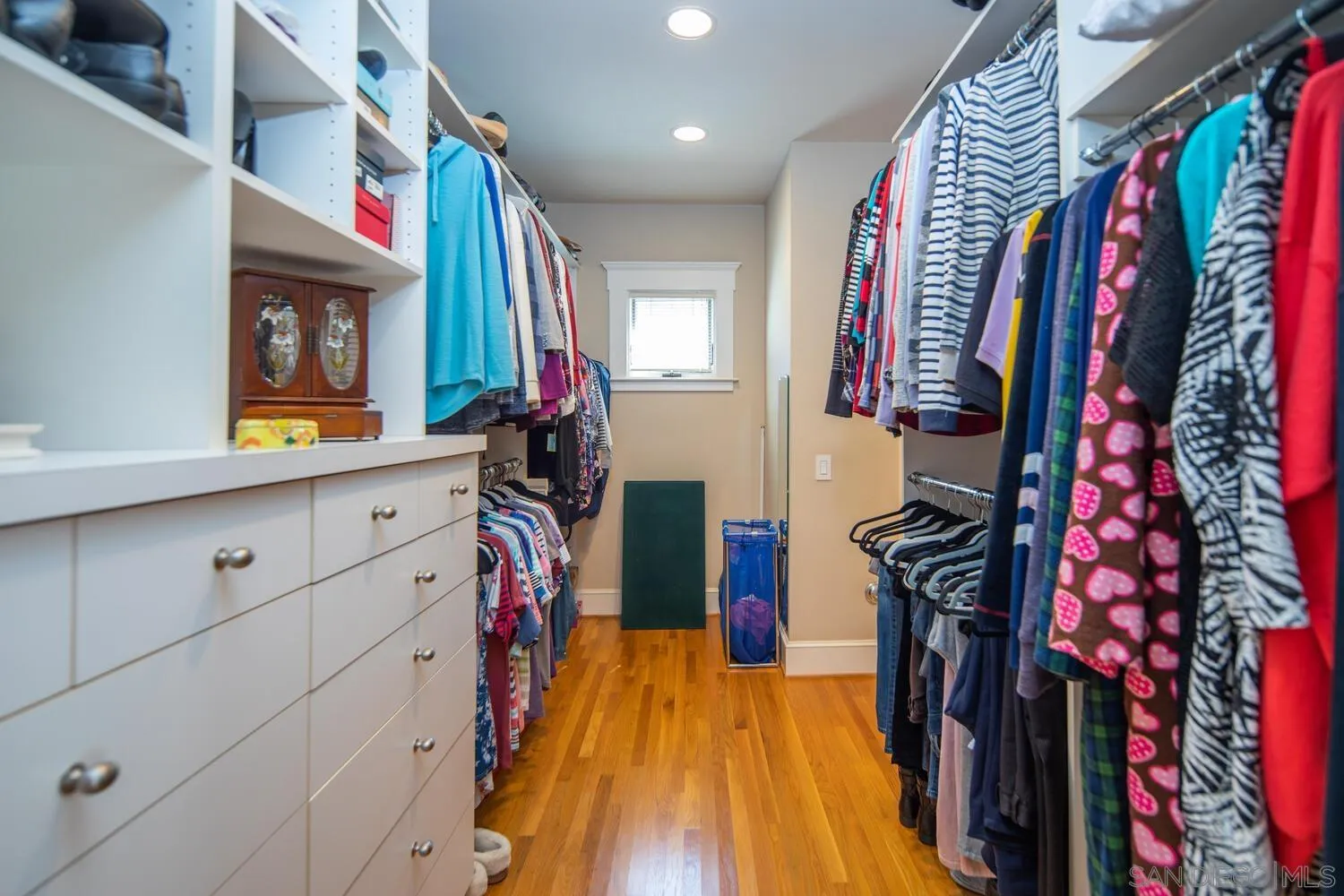 911 B Avenue Coronado, CA 92118 - Photo 24 of 45 a view of walk in closet with clothes and shoes