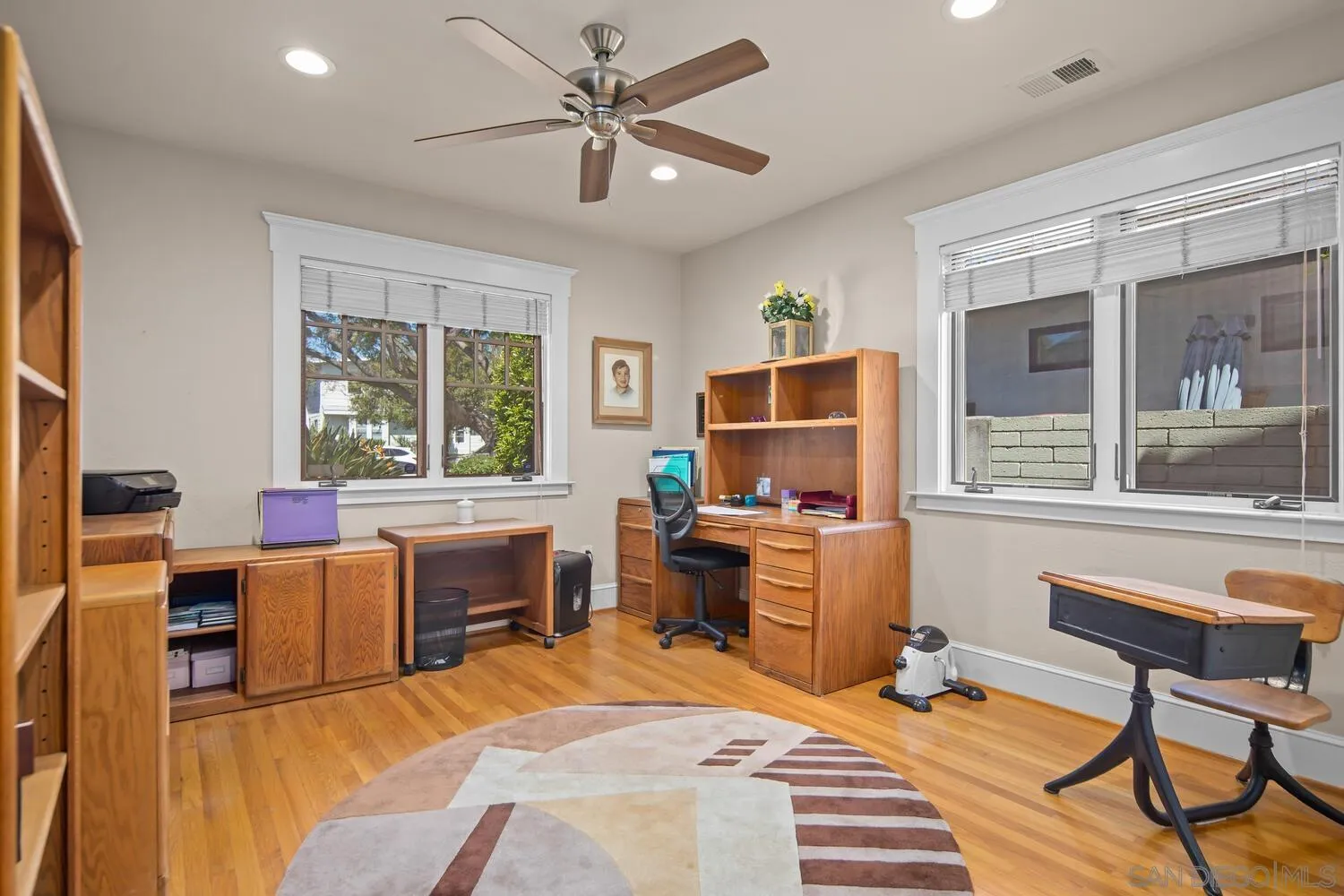 911 B Avenue Coronado, CA 92118 - Photo 26 of 45 a bedroom with a bed and a desk