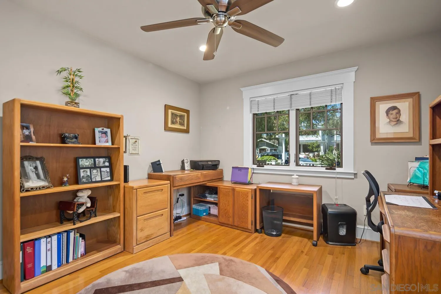 911 B Avenue Coronado, CA 92118 - Photo 27 of 45 a work room with furniture window and book shelfs