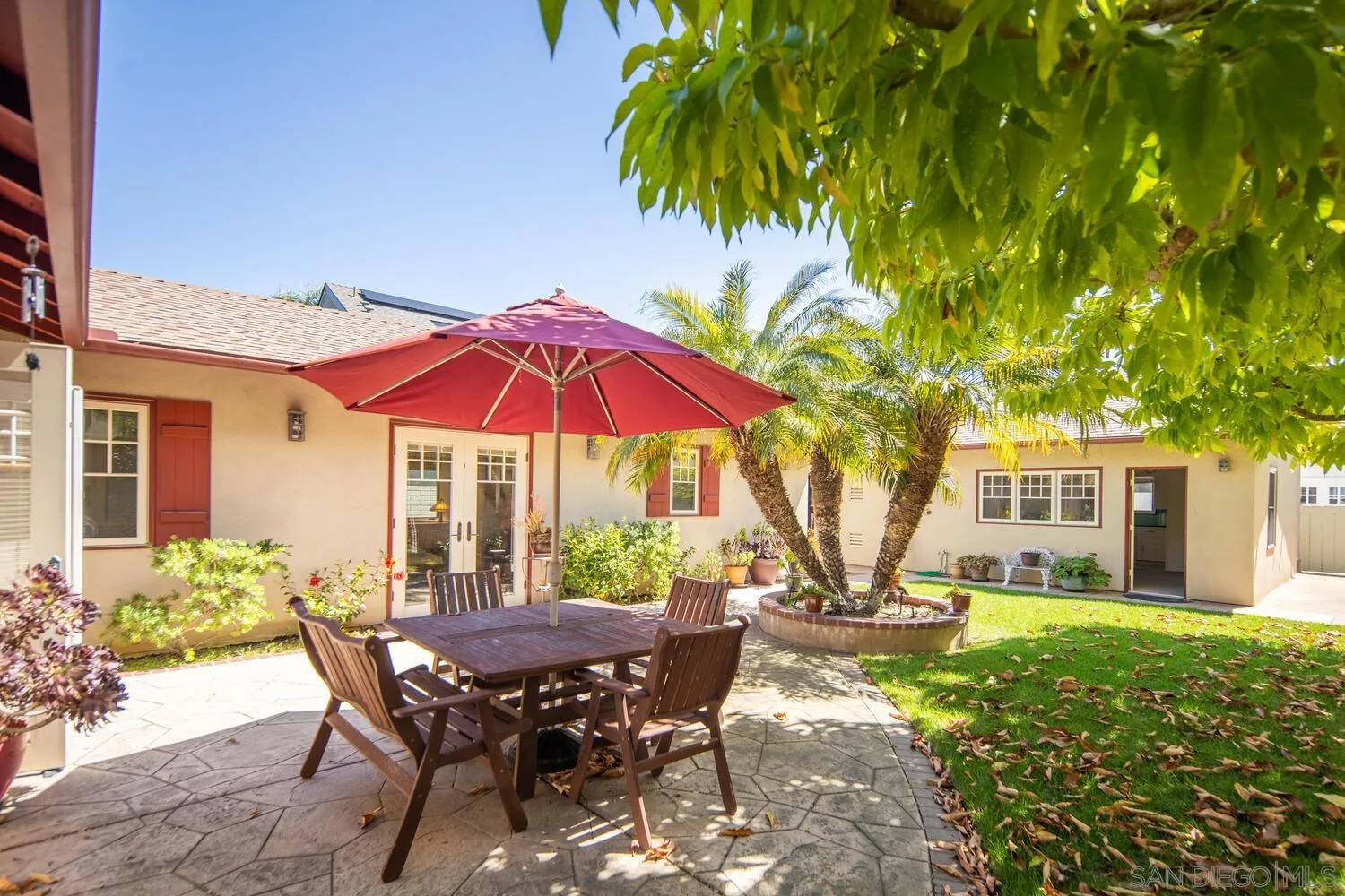 911 B Avenue Coronado, CA 92118 - Photo 31 of 45 a view of a house with backyard and sitting area
