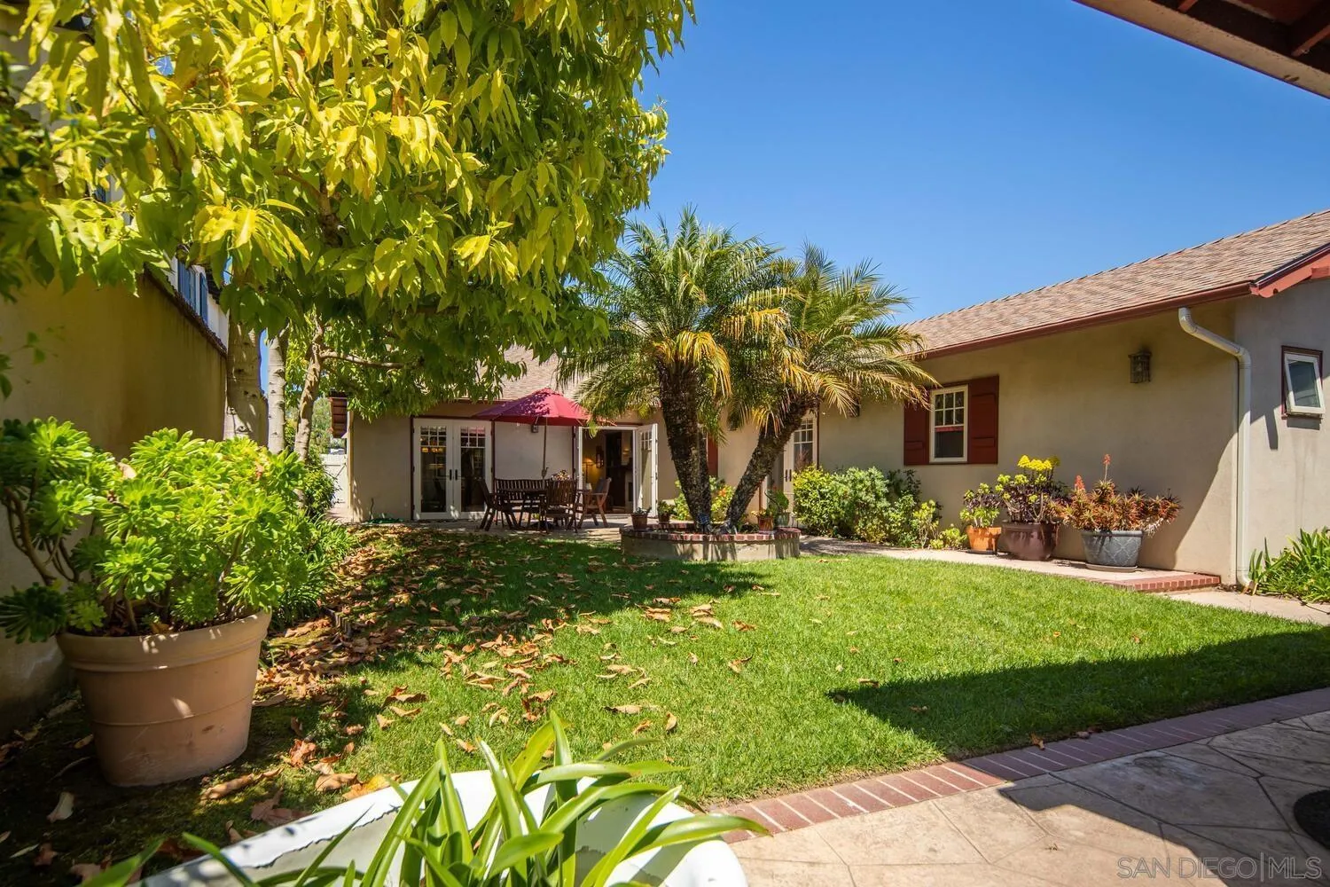 911 B Avenue Coronado, CA 92118 - Photo 32 of 45 a front view of a house with garden