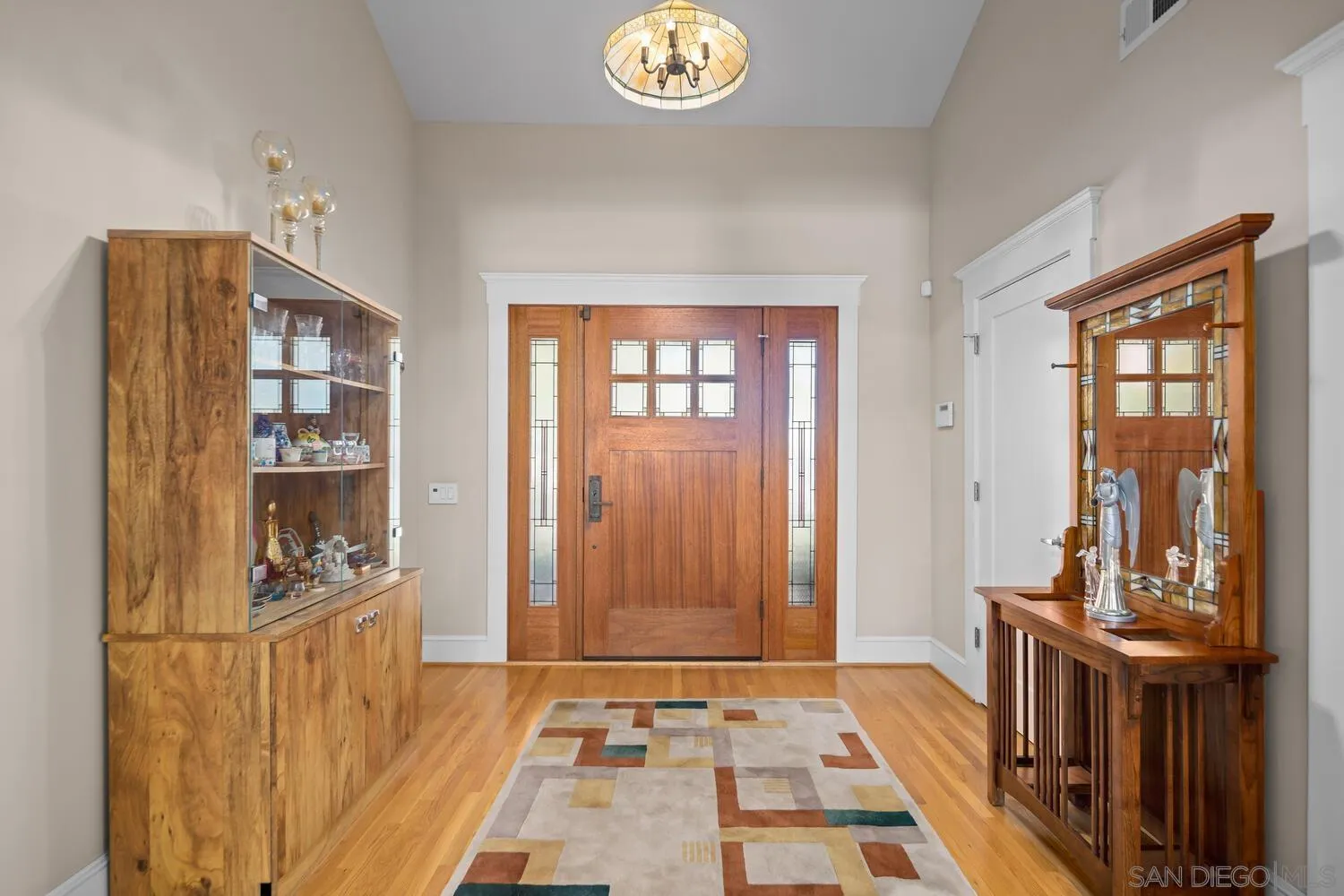 911 B Avenue Coronado, CA 92118 - Photo 7 of 45 a view of an entryway with wooden floor
