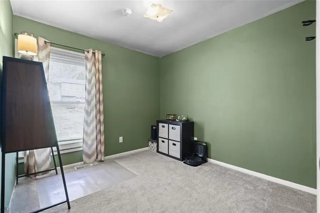 a room with furniture and a window