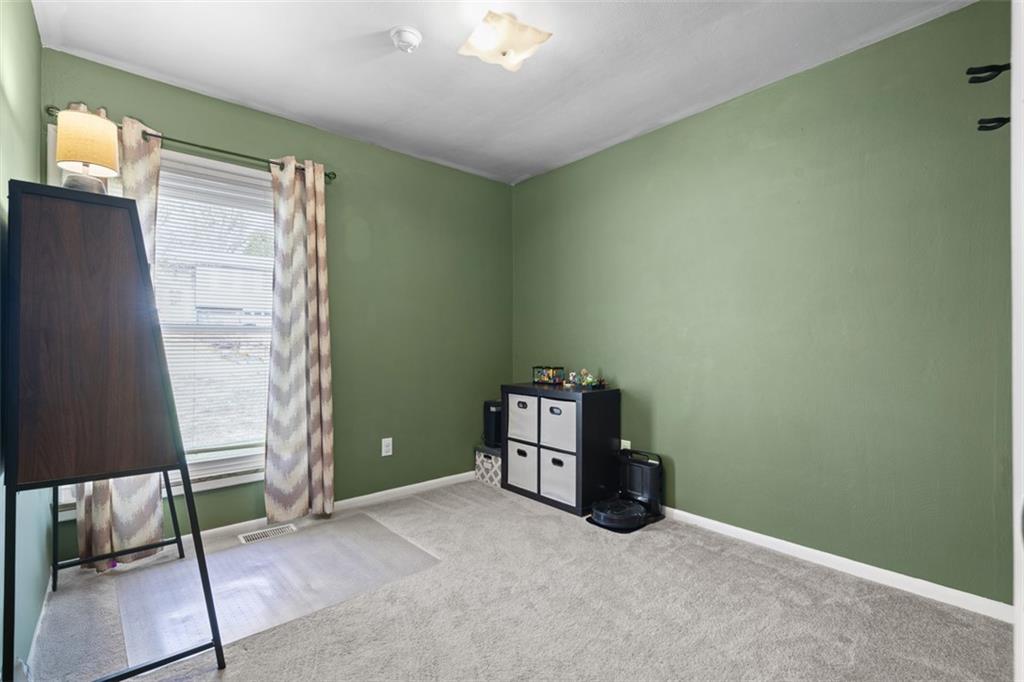 420 Donnell Road Lower Burrell, PA 15068 - Photo 19 of 33 a room with furniture and a window