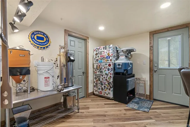 a view of a table and chairs in a kitchen
