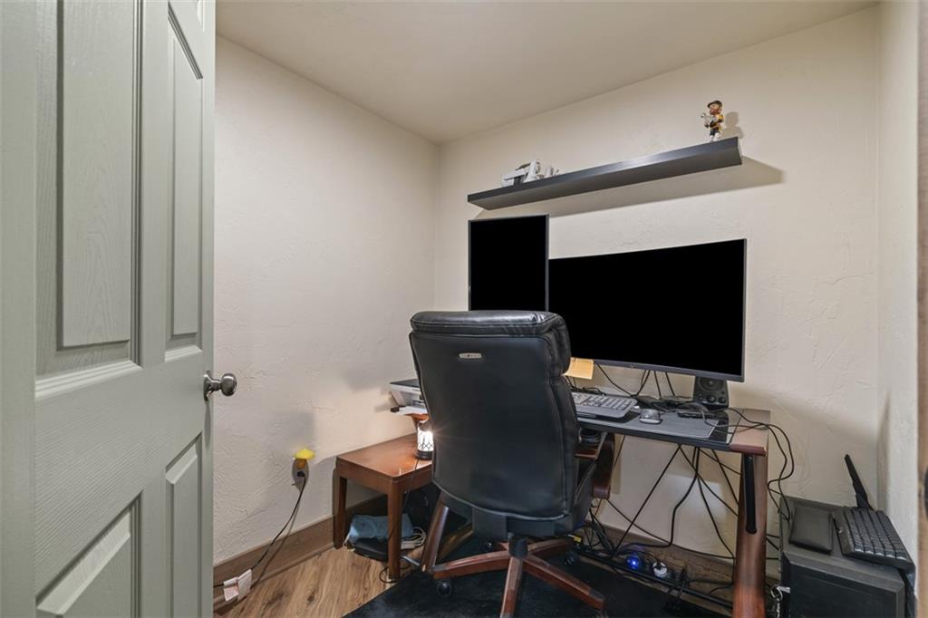 420 Donnell Road Lower Burrell, PA 15068 - Photo 24 of 33 a view of a workspace with furniture and wooden floor