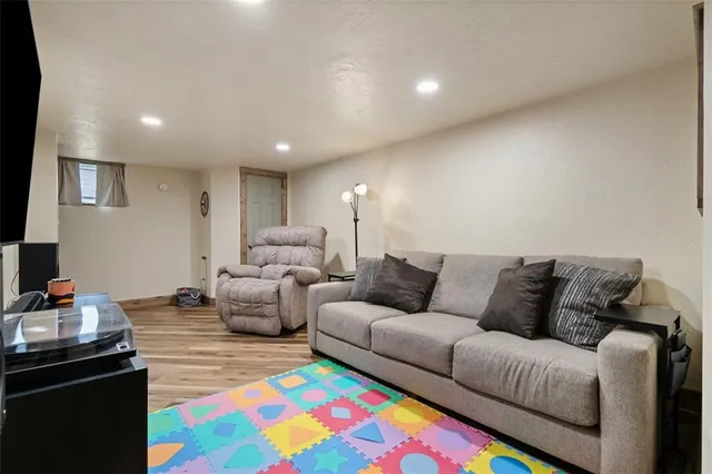 a living room with furniture and a couch