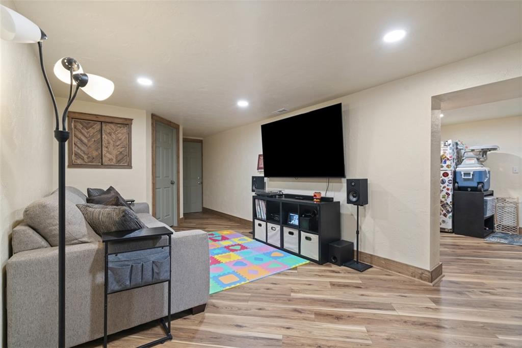420 Donnell Road Lower Burrell, PA 15068 - Photo 27 of 33 a living room with furniture and a flat screen tv