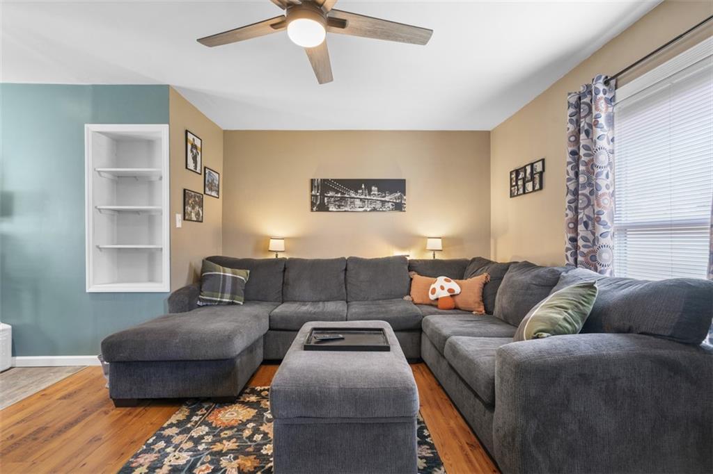 420 Donnell Road Lower Burrell, PA 15068 - Photo 7 of 33 a living room with furniture and a large window