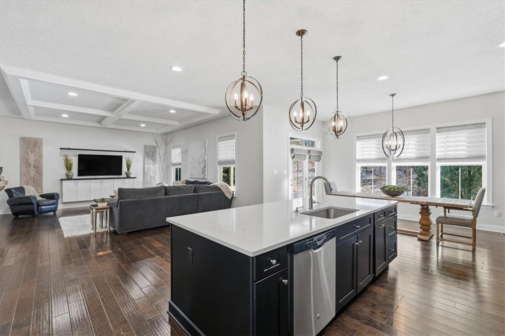 147 Seneca Place Mars, PA 16046 - Photo 15 of 44 a kitchen with a sink stove and wooden floor