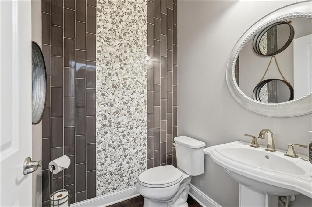 147 Seneca Place Mars, PA 16046 - Photo 18 of 44 a bathroom with a sink a toilet and a mirror