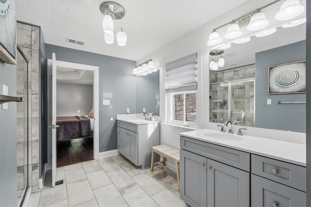 147 Seneca Place Mars, PA 16046 - Photo 23 of 44 a bathroom with a sink a washer and dryer