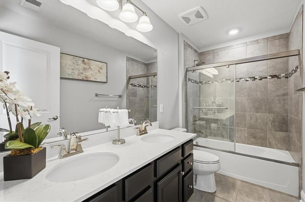 147 Seneca Place Mars, PA 16046 - Photo 28 of 44 a bathroom with a sink a toilet and shower