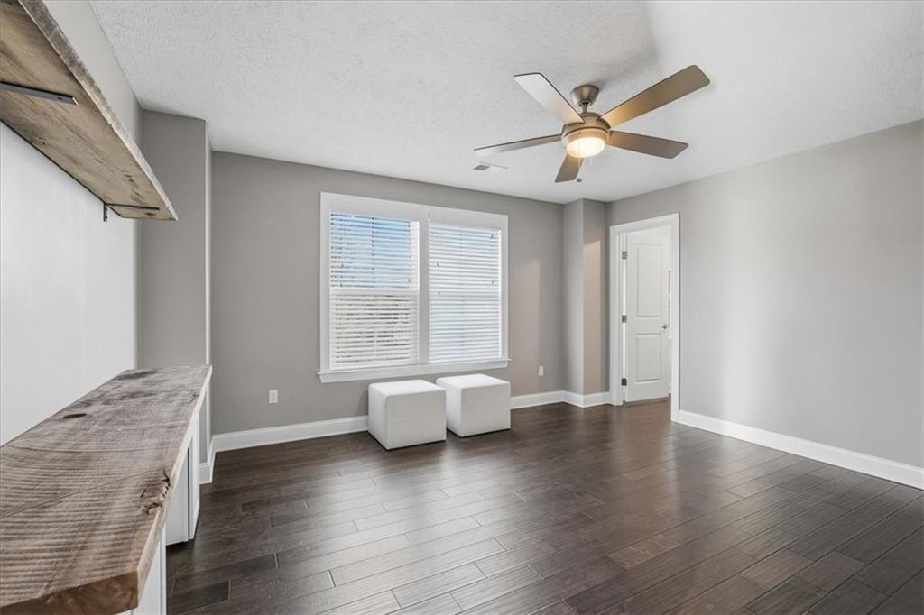 147 Seneca Place Mars, PA 16046 - Photo 29 of 44 a view of an empty room with wooden floor and a window