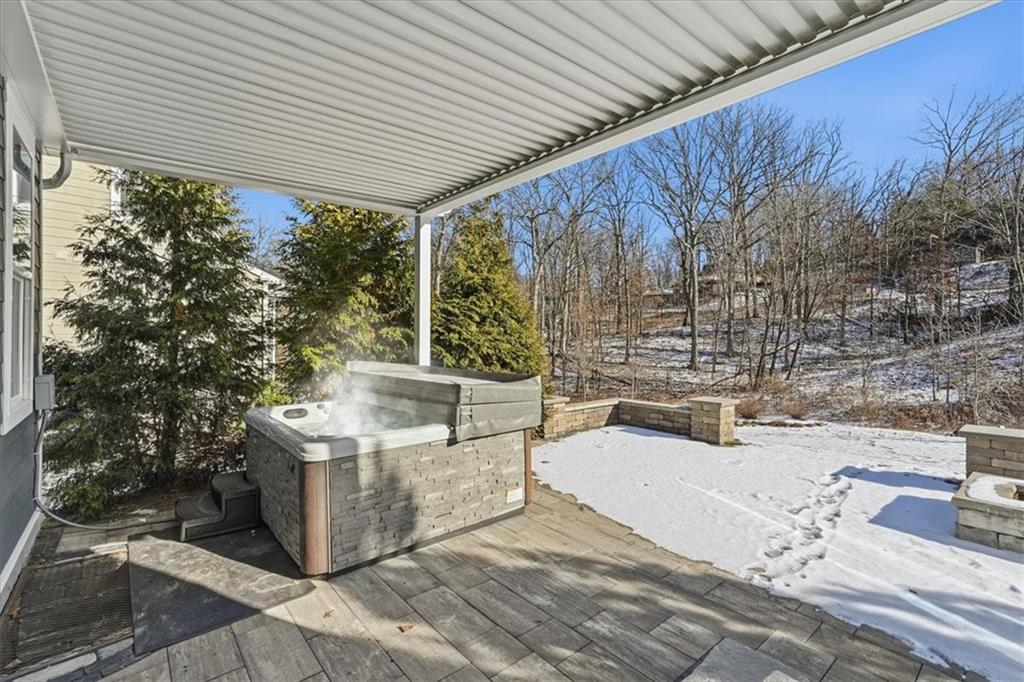 147 Seneca Place Mars, PA 16046 - Photo 39 of 44 a view of a patio with table and chairs with wooden fence and plants