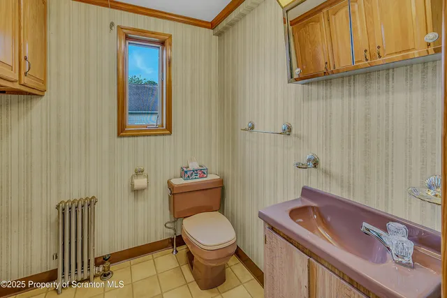 a bathroom with a sink and a toilet